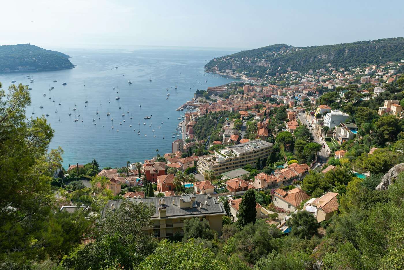 The deep bay of Villefranche-sur-Mer curving toward Cap Ferrat